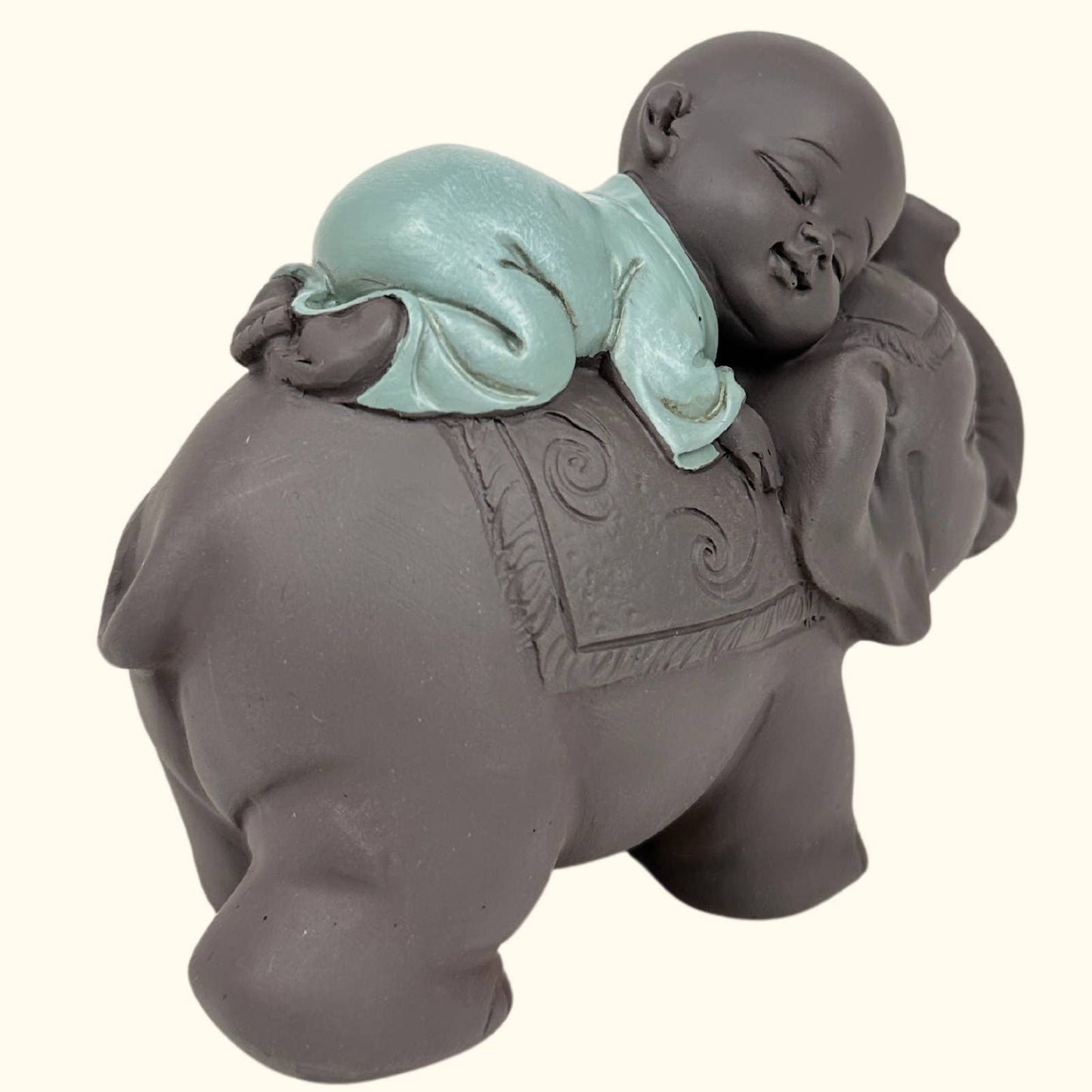 Buddha baby figur på en Feng Shui Lucky Elephant