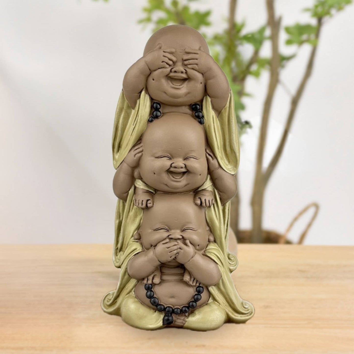 Tre Buddha figurer