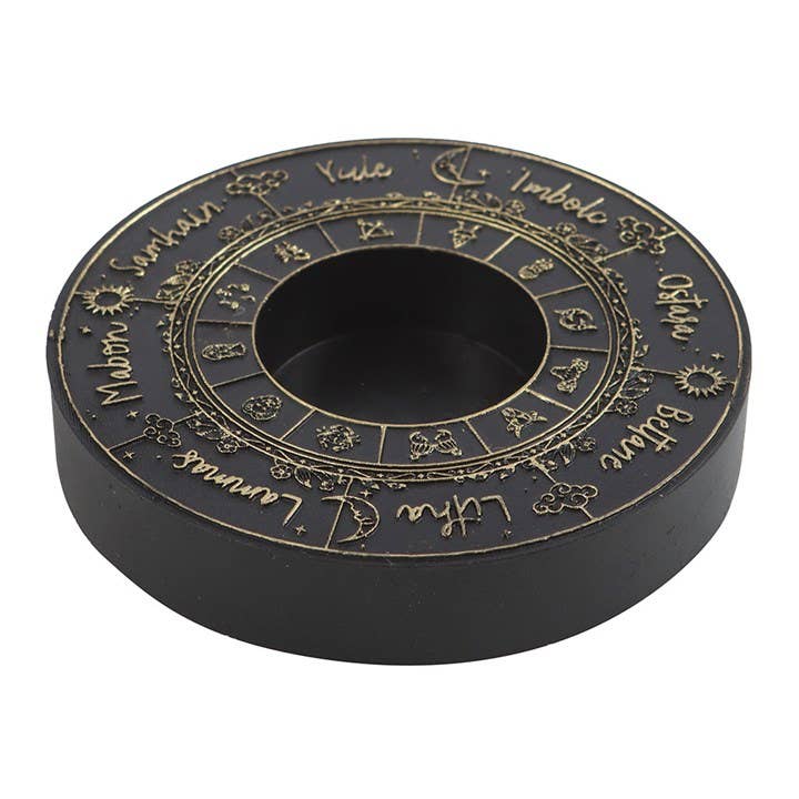 Telysholder med årshjulet